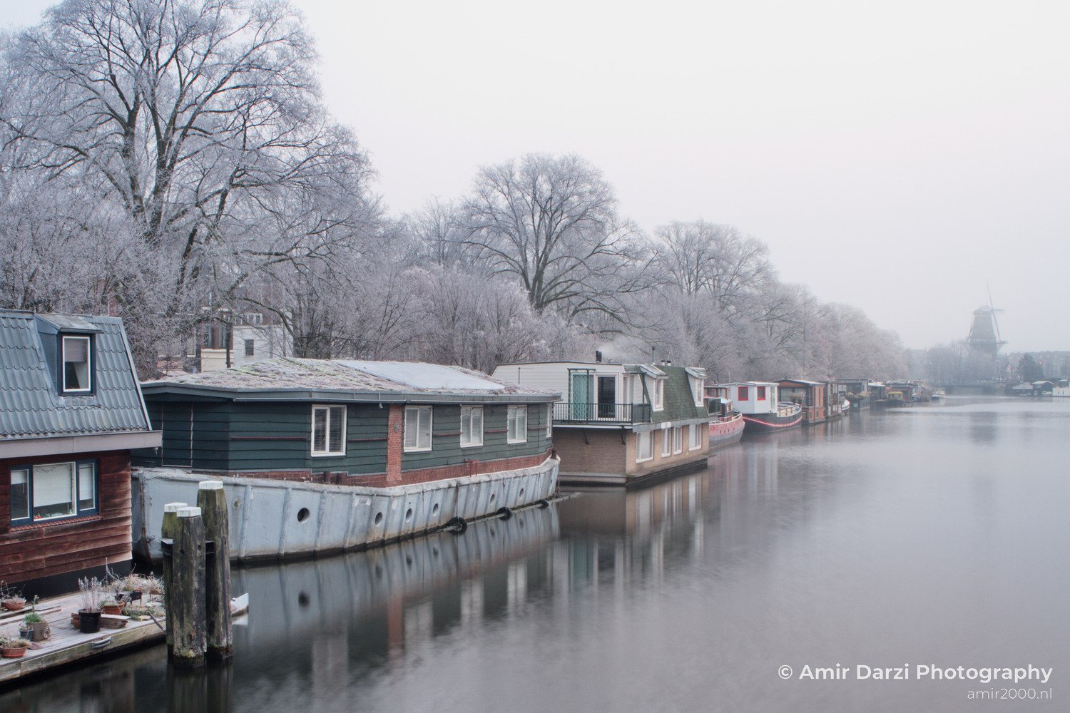 Amsterdam winter icy day fog Netherlands Cityscape in Amsterdam Netherlands Photo 2