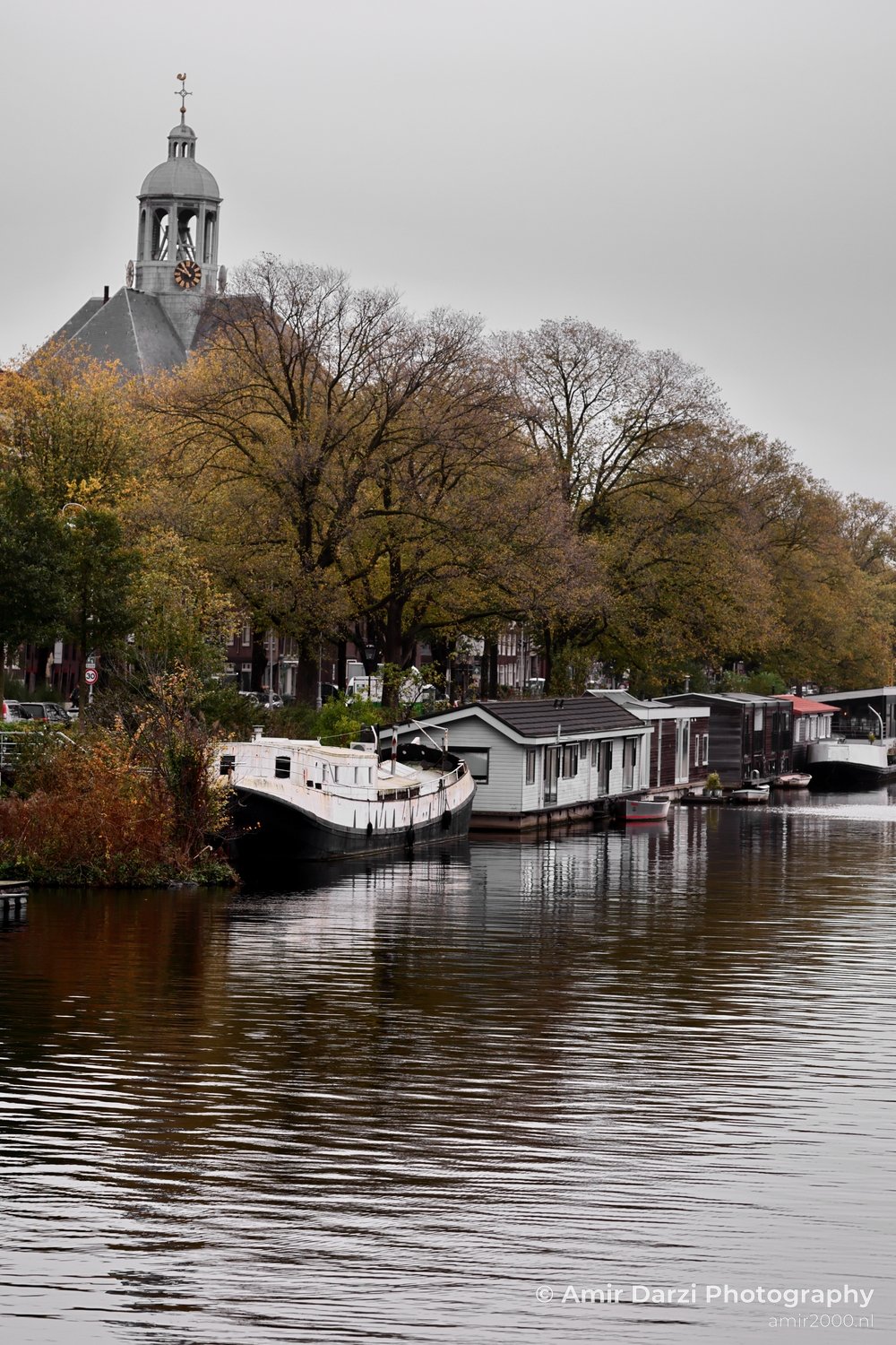 Church canal historic view Amsterdam fall Urban Street Cityscape Netherlands in Amsterdam Netherlands