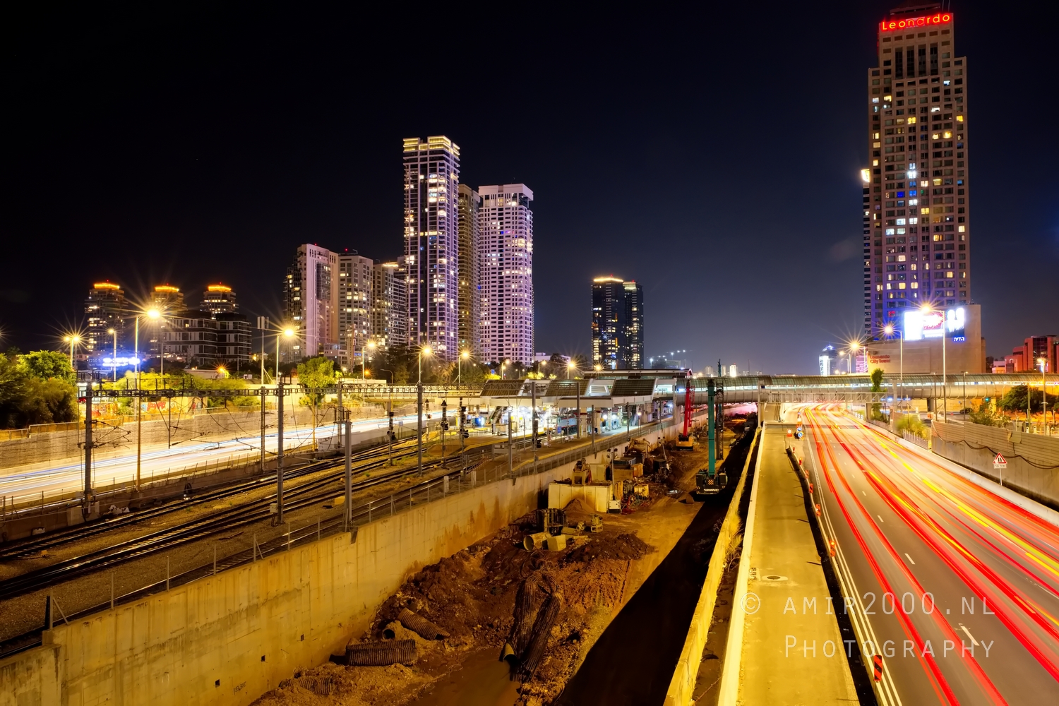 Ayalon Highway long exposure from Arlozorov bridge with light trails and towers