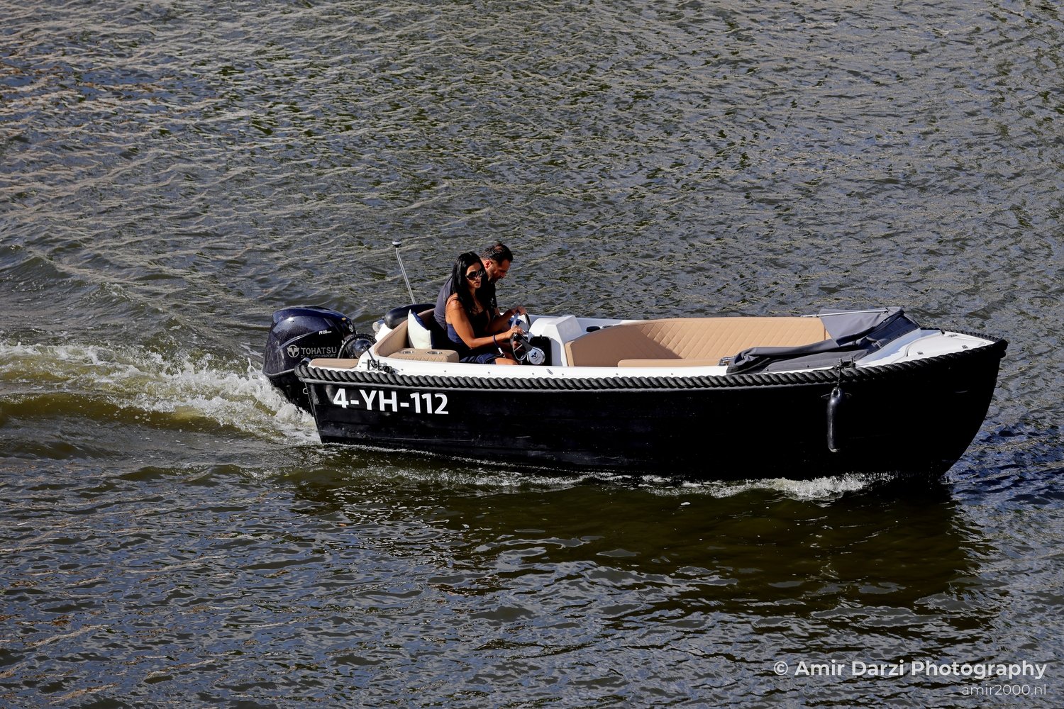 Boating On the Canal Amsterdam Netherlands People Creative from People Creative Collection series