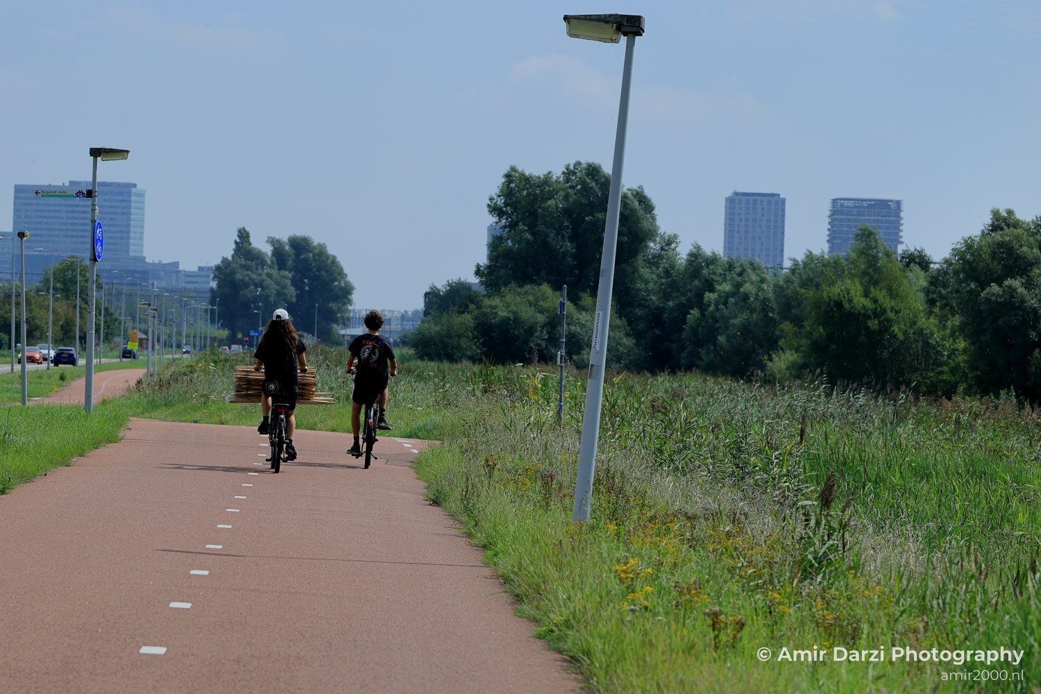 Cycling in the city Amsterdam Netherlands People Creative from People Creative Collection series Photo 1