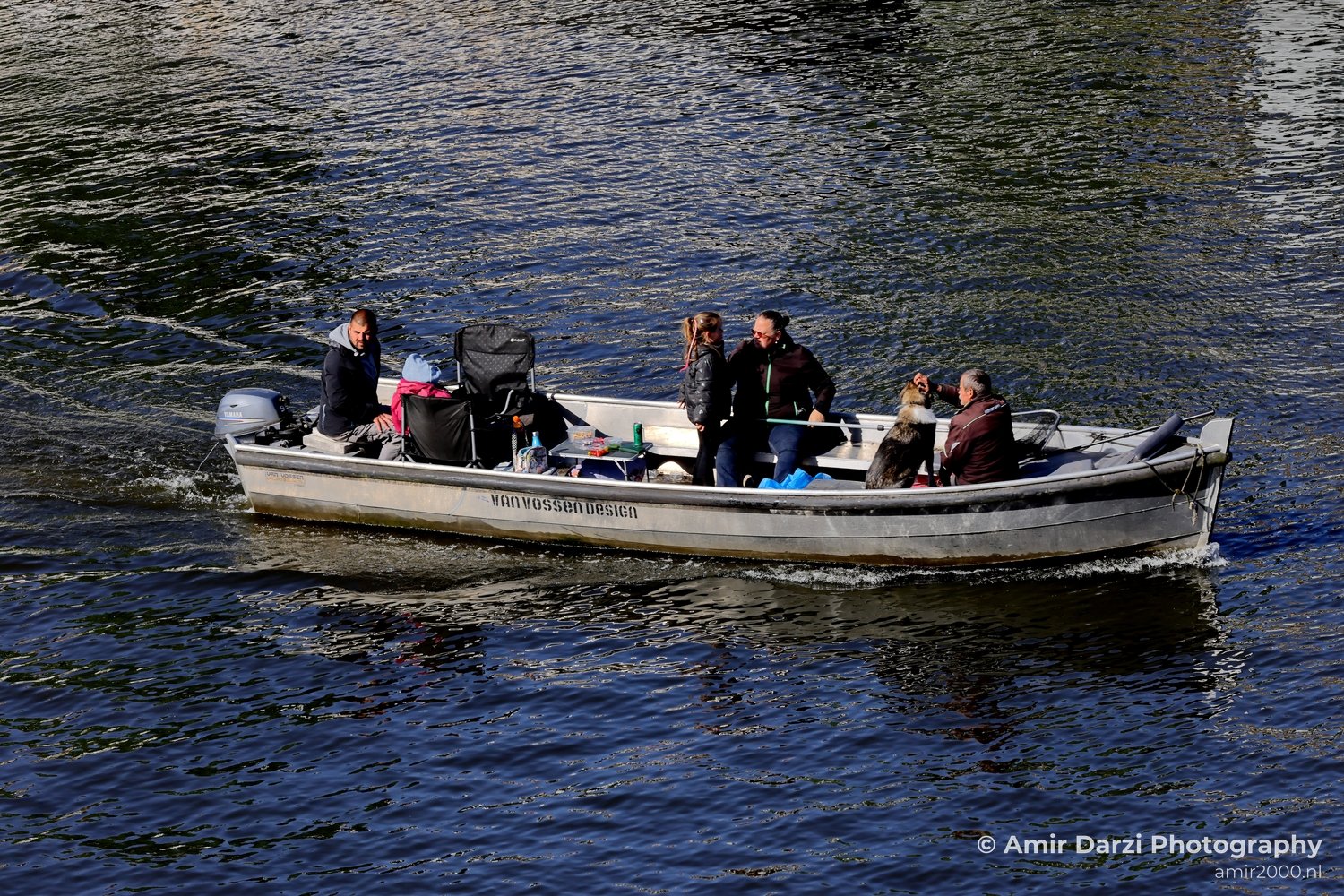 Family enjoy on a boat in the canals Amsterdam Netherlands People Creative from People Creative Collection series
