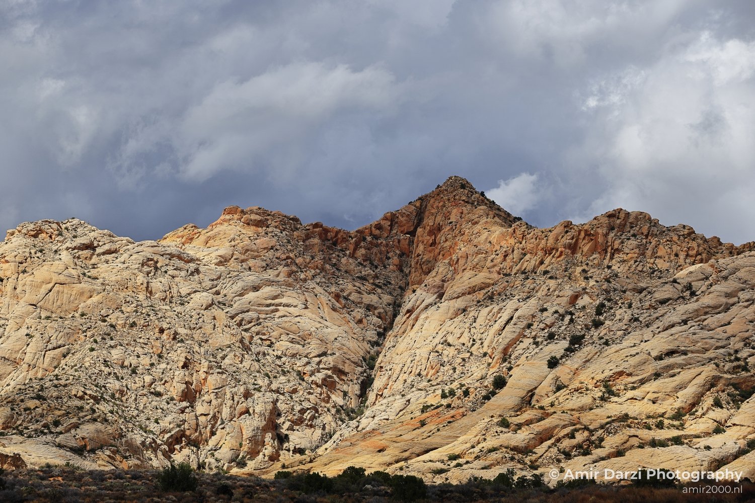 Rocky mountains and clouds in Utah's Snow Canyon State Park.