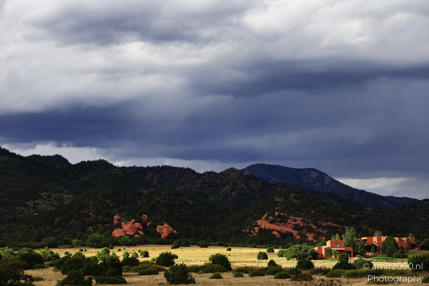 Stormy weather on the way Mountainous terrain with storm clouds approaching in Colorado USA