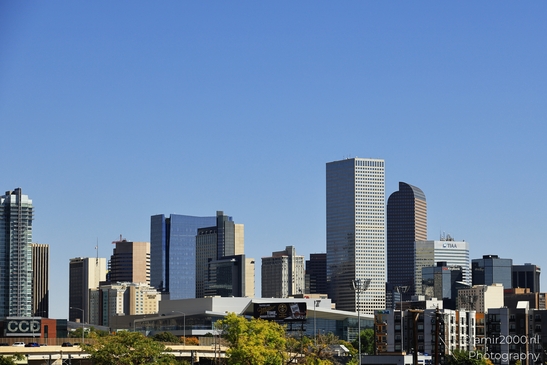 Cityscape and clear blue sky Aerial perspective of the urban landscape of Denver, Colorado with a image from year 2025 #4