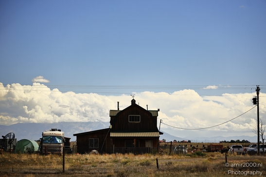 Cloudy_sky_over_rural_area_Colorado_USA_American_cities_Towns_Photography_Canon_EOS_R5_Mark_II_2025_001.JPG