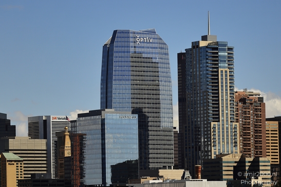 The skyline of Denver Colorado USA with modern high-rise buildings under a clear blue sky. - image from year 2025 #004