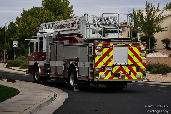 Across St George Utah, a truck travels through roadway traffic flow with an intersection in the - image from year 2025 #002