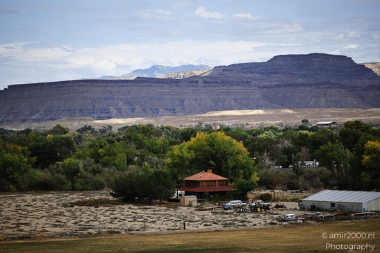 A rural landscape with a large mountainous backdrop in Utah USA. - image from year 2025 #003