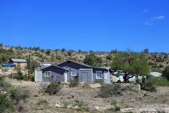 Small places on the go road trip in Arizona USA. A quaint desert home nestled in a rocky - image from year 2025 #002