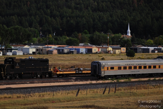 Small places on the go road trip in Arizona USA. A train traveling through a rural landscape in - image from year 2025 #006