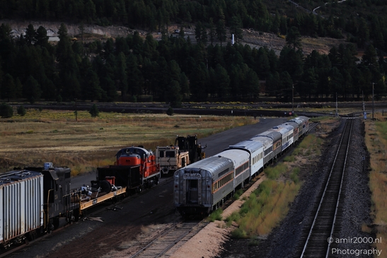 Small places on the go road trip in Arizona USA. A train journeying through a desert landscape - image from year 2025 #007
