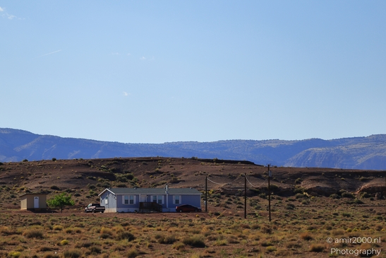 Small places on the go road trip in Arizona USA. A small house in a desert landscape. - image from year 2025 #020