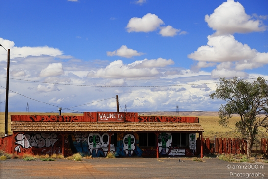 Small places on the go road trip in Arizona USA. A small, abandoned building in a desert town. - image from year 2025 #048