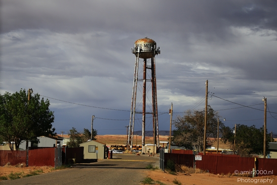 Small places on the go road trip in Arizona USA. A tall water tower stands in a desert town. - image from year 2025 #060