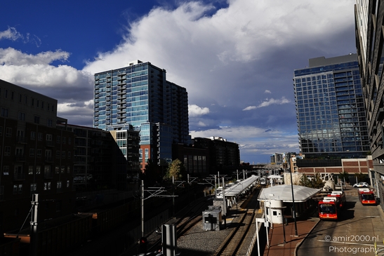 A bustling with a mix of transportation modes and contemporary buildings. - image from year 2025 #026