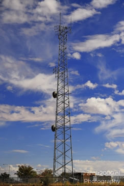 Towering Over The Desert in Arizona USA. A tower stands tall against the backdrop of a partly - image from year 2025 #002
