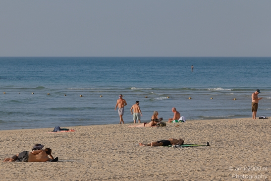 Beachgoers_Enjoying_A_Sunny_Day_At_The_Beach_Tel_Aviv_jaffa_Israel_People_Creative_Collection_Photography_Canon_EOS_R5_Mark_II_2025_004.JPG