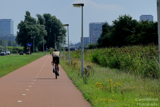 Cycling_in_the_city_Amsterdam_Netherlands_People_Creative_Collection_Photography_Canon_EOS_R5_Mark_II_2025_002.JPG