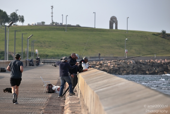 Fishermen_On_A_Pier_With_Jogger_Tel_Aviv_jaffa_Israel_People_Creative_Collection_Photography_Canon_EOS_R5_Mark_II_2025_001.JPG