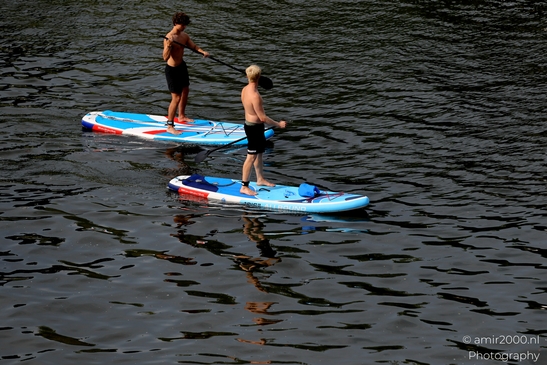 Fun_with_Surfboard_in_the_canals_Amsterdam_Netherlands_People_Creative_Collection_Photography_Canon_EOS_R5_Mark_II_2025_002.JPG