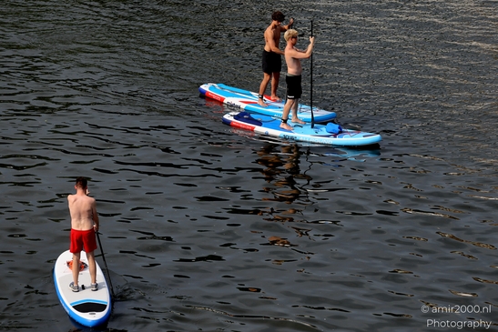 Fun_with_Surfboard_in_the_canals_Amsterdam_Netherlands_People_Creative_Collection_Photography_Canon_EOS_R5_Mark_II_2025_003.JPG