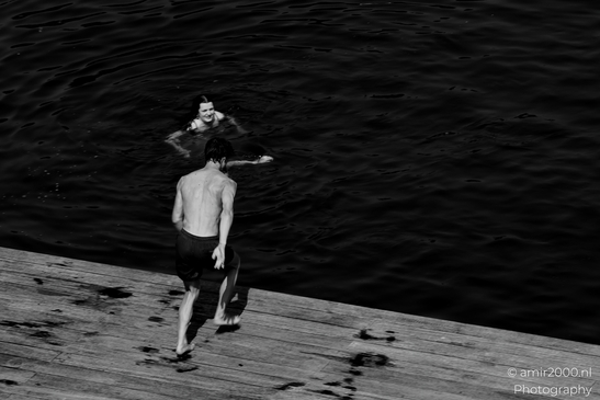 Jumping_to_the_canal_Black_and_White_series_Amsterdam_Netherlands_People_Creative_Collection_Photography_Canon_EOS_R5_Mark_II_2025_001.JPG