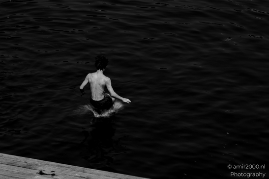 Jumping_to_the_canal_Black_and_White_series_Amsterdam_Netherlands_People_Creative_Collection_Photography_Canon_EOS_R5_Mark_II_2025_004.JPG