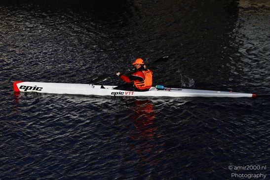 Kayaker_In_Orange_Life_Vest_Paddling_In_Canal_Amsterdam_Netherlands_People_Creative_Collection_Photography_Canon_EOS_R5_Mark_II_2025_001.JPG