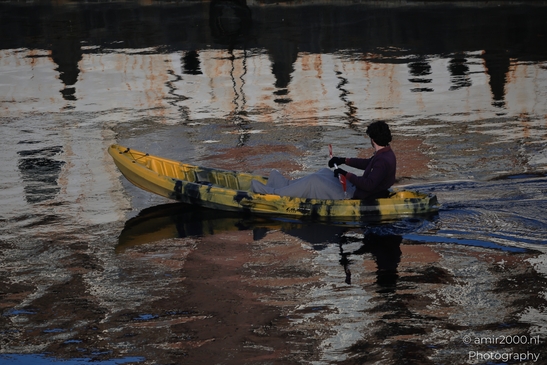 Kayaker_In_Yellow_Canoe_On_Canal_With_Reflections_Amsterdam_Netherlands_People_Creative_Collection_Photography_Canon_EOS_R5_Mark_II_2025_001.JPG