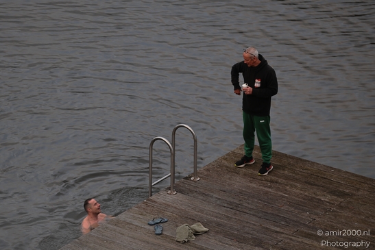 Man_On_Dock_With_Beverage_In_Canal_Nieuwevaart_Amsterdam_Netherlands_People_Creative_Collection_Photography_Canon_EOS_R5_Mark_II_2025_001.JPG