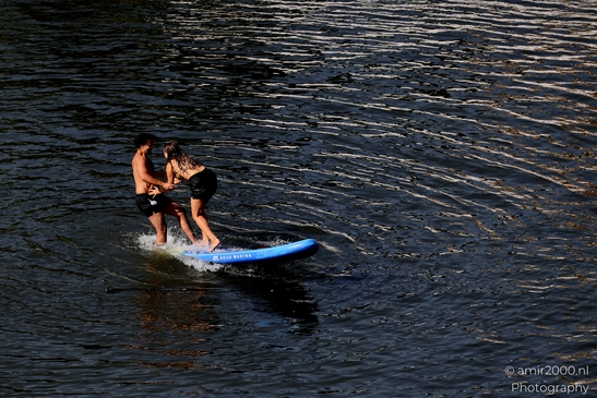 Man_Relaxing_On_Surfboard_summer_scenery_in_the_city_Amsterdam_Netherlands_People_Creative_Collection_Photography_Canon_EOS_R5_Mark_II_2025_002.JPG