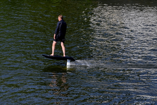 Man_Surfing_On_Paddleboard_in_the_Canal_Amsterdam_Netherlands_People_Creative_Collection_Photography_Canon_EOS_R5_Mark_II_2025_001.JPG
