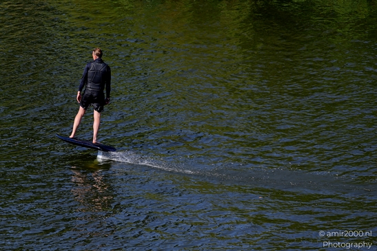 Man_Surfing_On_Paddleboard_in_the_Canal_Amsterdam_Netherlands_People_Creative_Collection_Photography_Canon_EOS_R5_Mark_II_2025_003.JPG