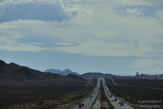 Desert_Highway_With_Traffic_in_Nevada_Transportation_Collection_USA_Highway_and_Road_Scenes_Photography_Canon_EOS_R5_Mark_II_2025_001.JPG