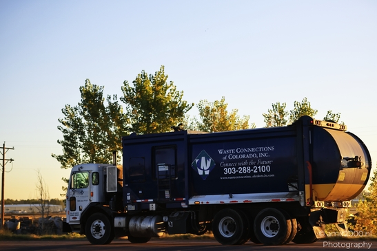 Garbage_Truck_Drives_Along_Denver_Colorado_Transportation_Collection_USA_Highway_and_Road_Scenes_Photography_Canon_EOS_R5_Mark_II_2025_001.JPG