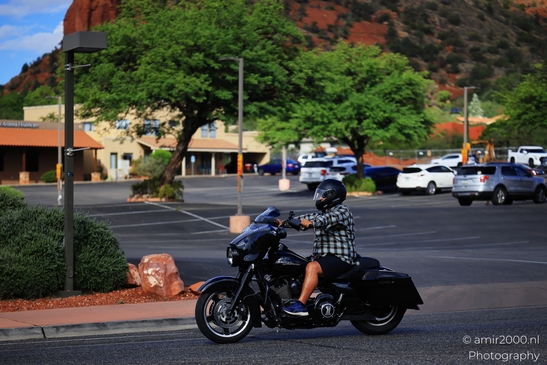 Motorcycle Rider Sedona Arizona Man riding a motorcycle on a city street in Transportation Collection image from year 2025 #1