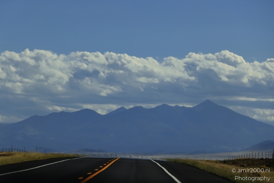 On The Way In Western USA in Transportation Collection. A lone highway stretches towards the - image from year 2025 #038