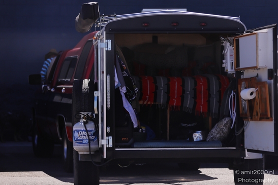 On The Way In Western USA in Transportation Collection. A large utility truck with its back - image from year 2025 #026