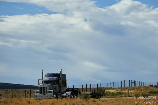 Semi_Truck_Drives_On_Rural_Highway_Colorado_Transportation_Collection_USA_Highway_and_Road_Scenes_Photography_Canon_EOS_R5_Mark_II_2025_001.JPG