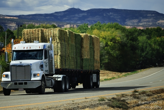 Semi_Truck_Drives_On_Rural_Highway_Colorado_Transportation_Collection_USA_Highway_and_Road_Scenes_Photography_Canon_EOS_R5_Mark_II_2025_003.JPG