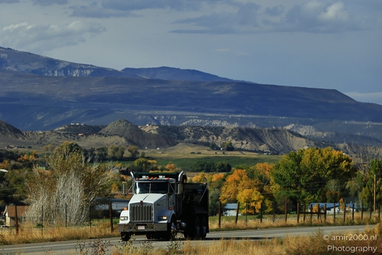Semitruck_Driving_On_Rural_Colorado_Transportation_Collection_USA_Highway_and_Road_Scenes_Photography_Canon_EOS_R5_Mark_II_2025_002.JPG