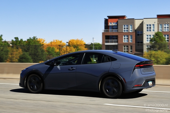 The Highway around Denver Colorado Electric vehicle driving on road with blurred background in image from year 2025 #3