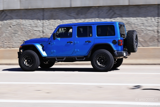 The Highway around Denver Colorado Blue Jeep Wrangler on a highway near Denver in Transportation image from year 2025 #5