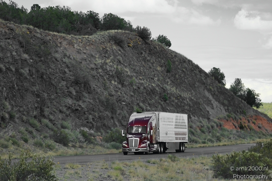Trucks In Arizona in Transportation Collection. A semi-truck on a desert highway in Arizona. - image from year 2025 #002
