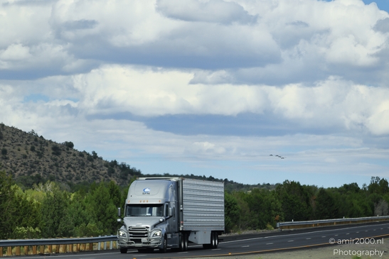 Trucks In Arizona in Transportation Collection. A semi-truck driving on a highway with - image from year 2025 #003