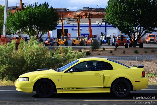 Yellow_Mustang_Driving_On_Road_St_George_Utah_Transportation_Collection_USA_Highway_and_Road_Scenes_Photography_Canon_EOS_R5_Mark_II_2025_001.JPG