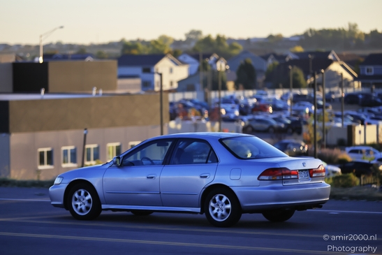 silver_car_driving_on_denver_colorado_streets_transportation_collection_usa_highway_and_road_scenes_photography_canon_eos_r5_mark_ii_2025_001.JPG