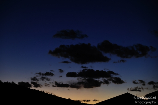 Clouds hovering above mountains during dusk near Avon Eagle County Colorado. image from year 2025 #2