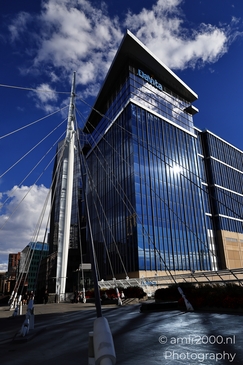 A contemporary skyscraper with a reflective facade in Denver Colorado USA. - image from year 2025 #004